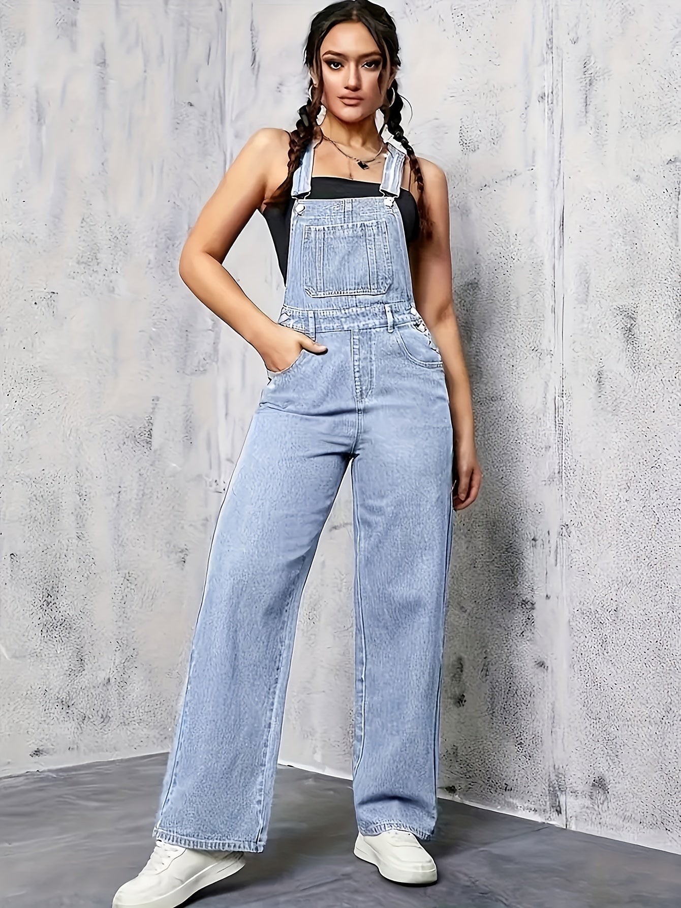 mouwloze denim overall met wijde pijp