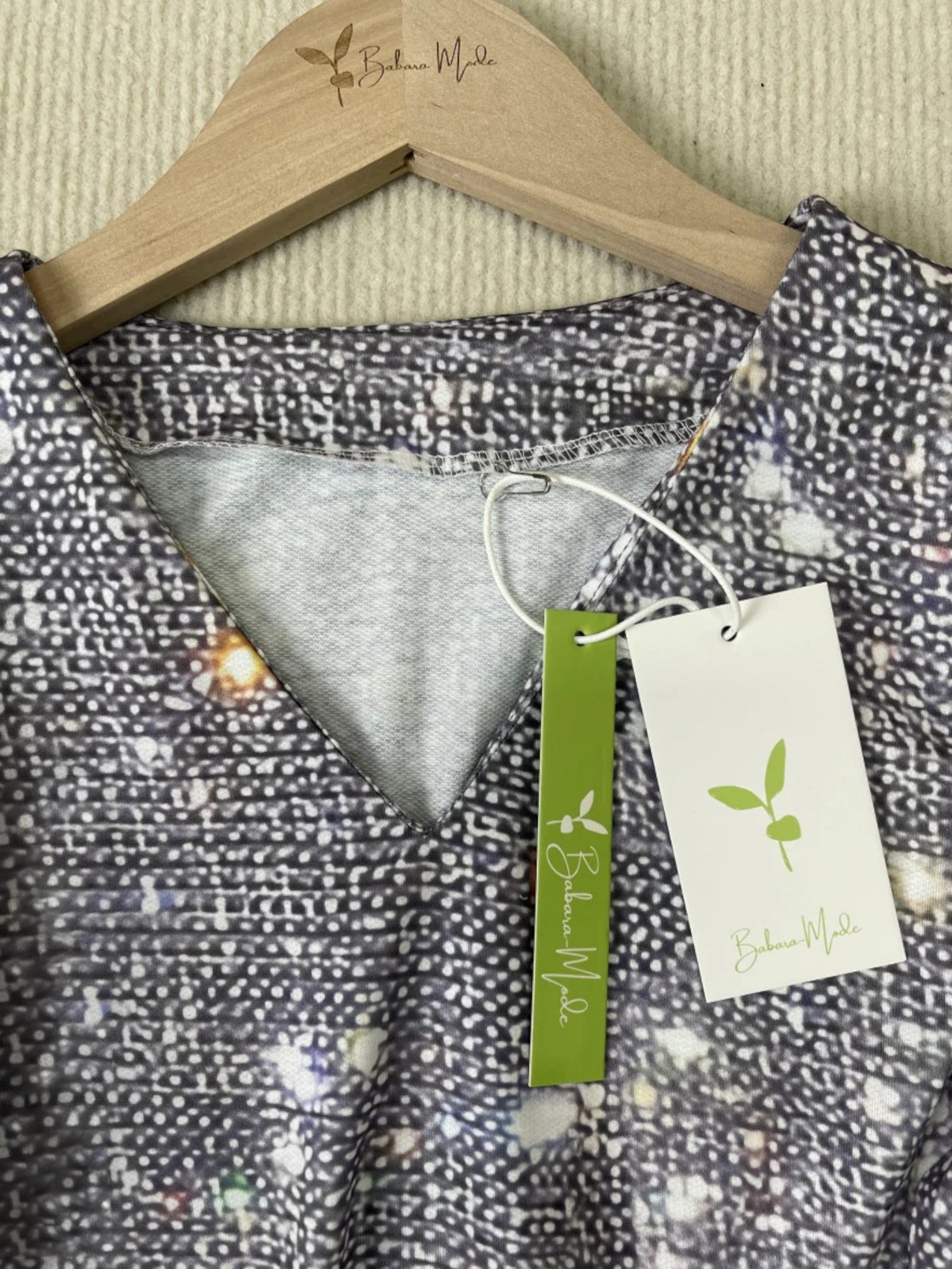 Maëlle | Glitterblouse Met V-hals | Lange Mouwen