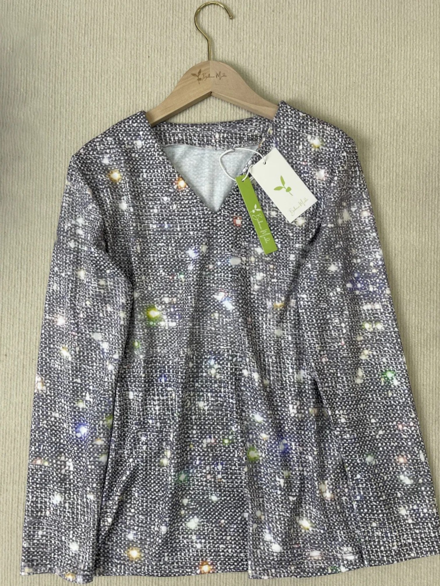 Maëlle | Glitterblouse Met V-hals | Lange Mouwen