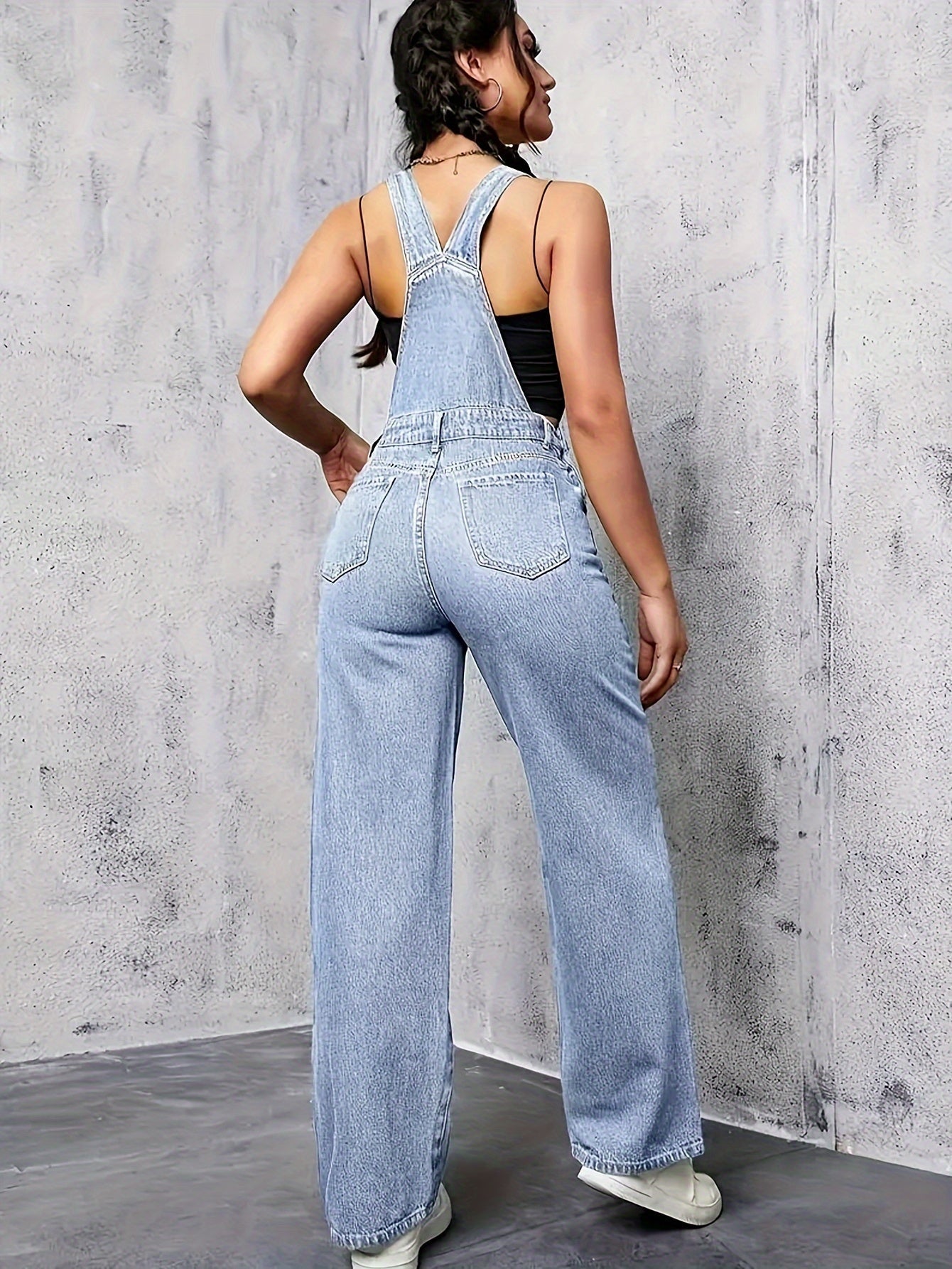 mouwloze denim overall met wijde pijp