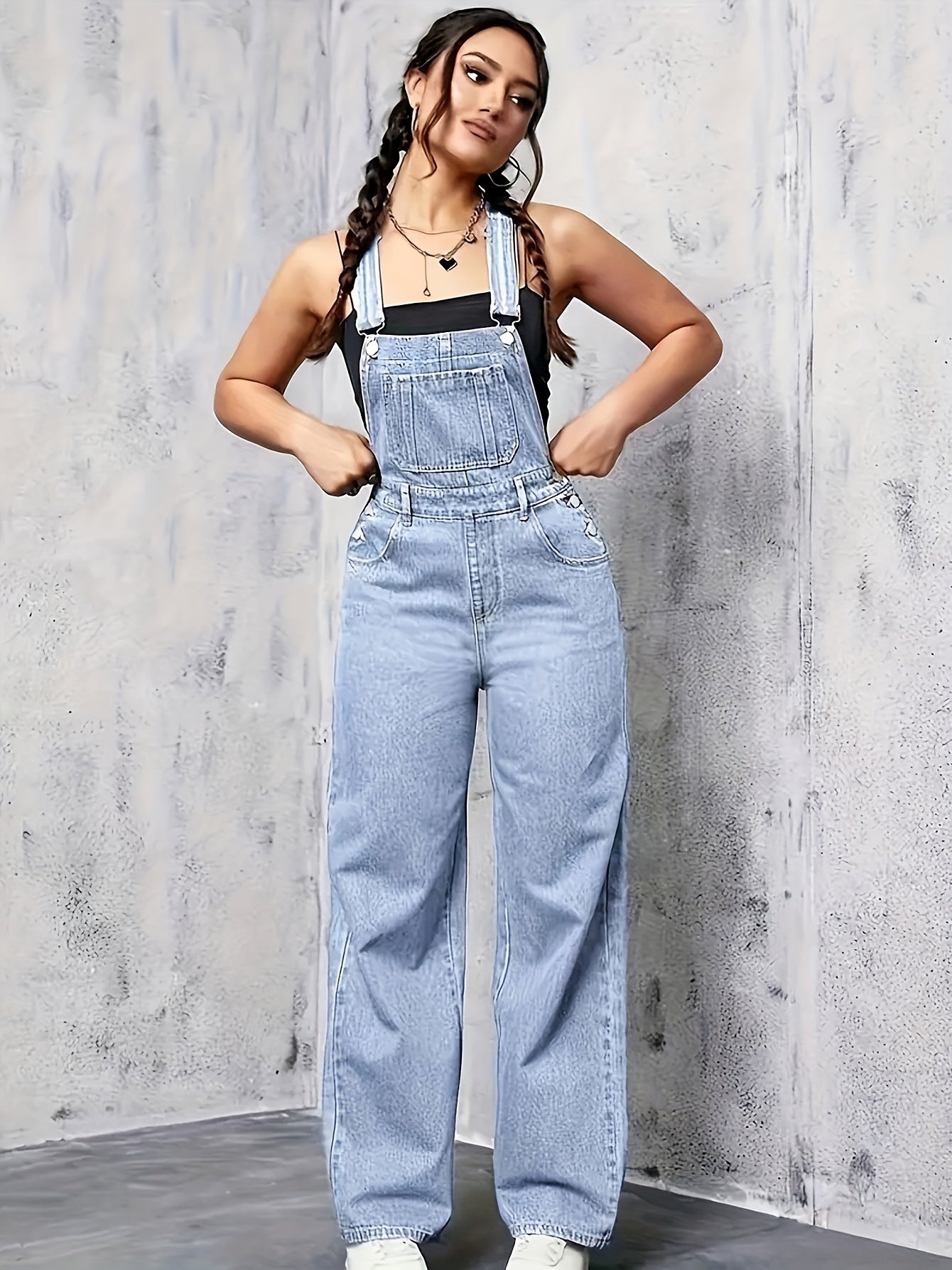 mouwloze denim overall met wijde pijp
