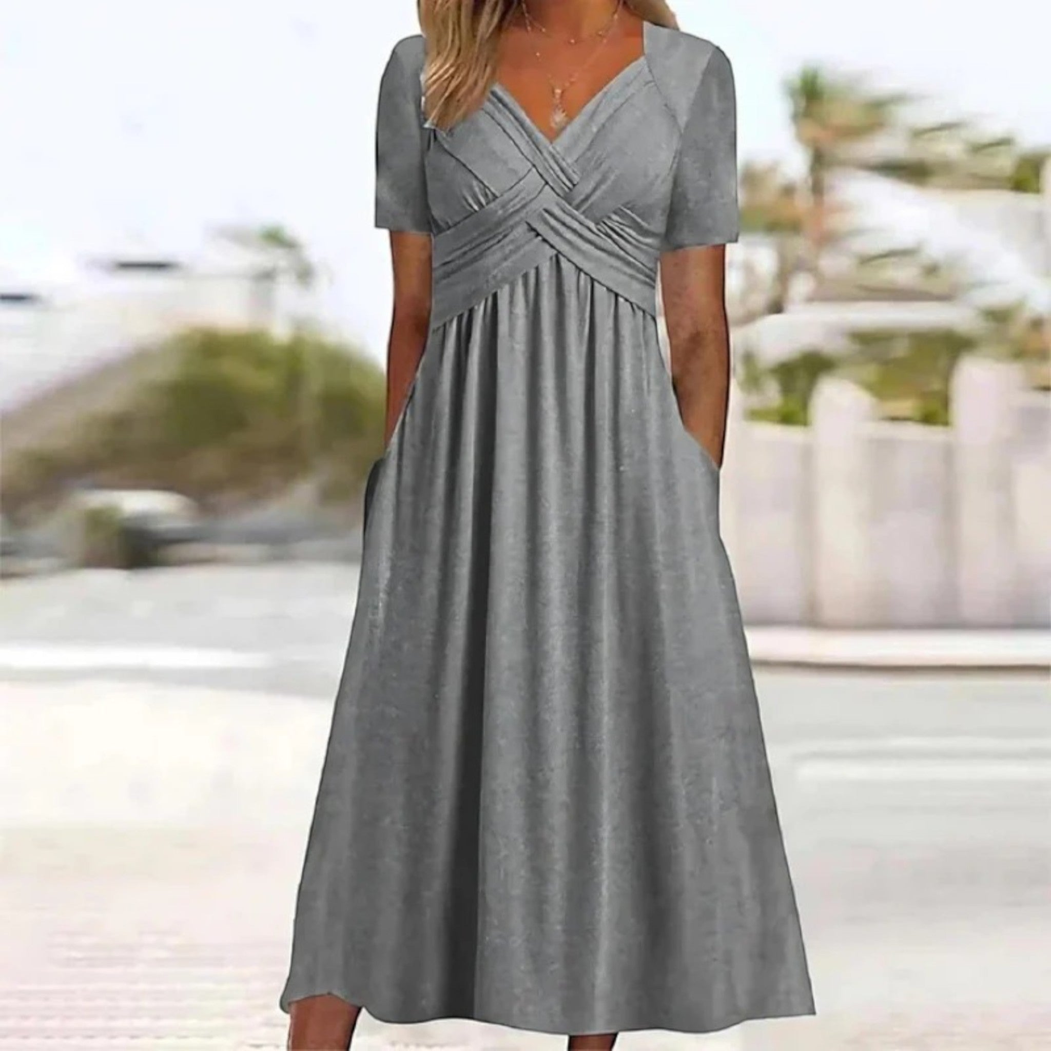 Malia | Zomerjurk Met V-hals En Zakken | Midi